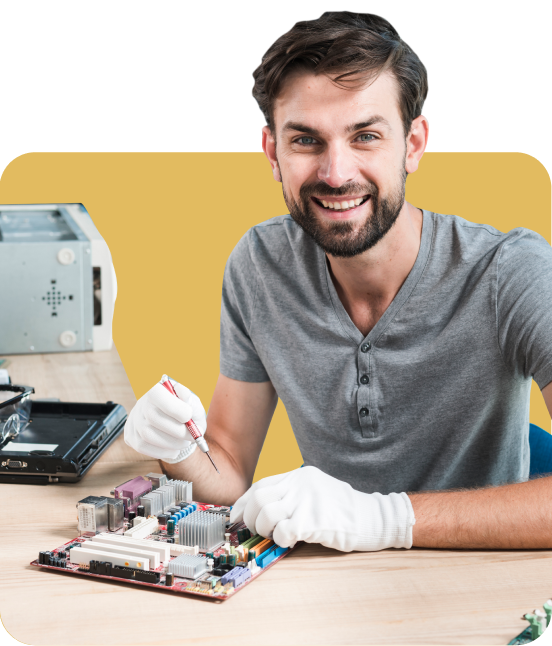 portrait-smiling-male-technician-working-computer-motherboard
